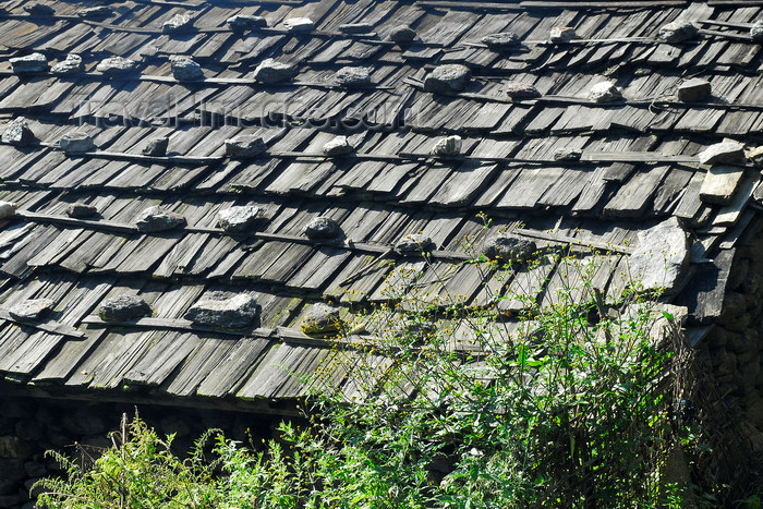 nepal117: Nepal - Langtang region - roof made with planks of wood and stones - photo by E.Petitalot - (c) Travel-Images.com - Stock Photography agency - Image Bank