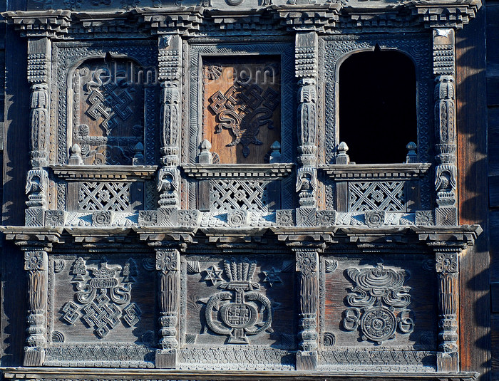 nepal118: Nepal - Langtang region - art on the wood facade of a house - photo by E.Petitalot - (c) Travel-Images.com - Stock Photography agency - Image Bank