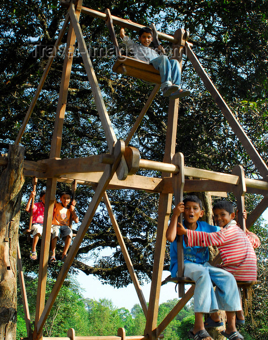 nepal170: Pokhara, Nepal: children playing on a festival wood swing - photo by E.Petitalot - (c) Travel-Images.com - Stock Photography agency - Image Bank