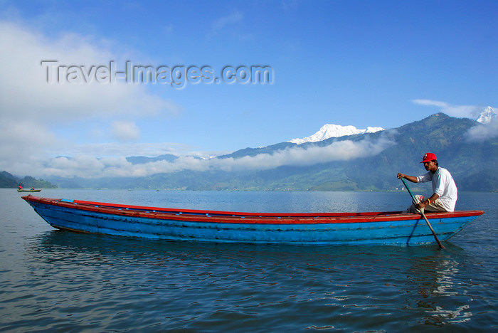 nepal180: Nepal, Pokhara: boatman on Phewa Tal (Lake) - mountains in the background - photo by J.Pemberton - (c) Travel-Images.com - Stock Photography agency - Image Bank