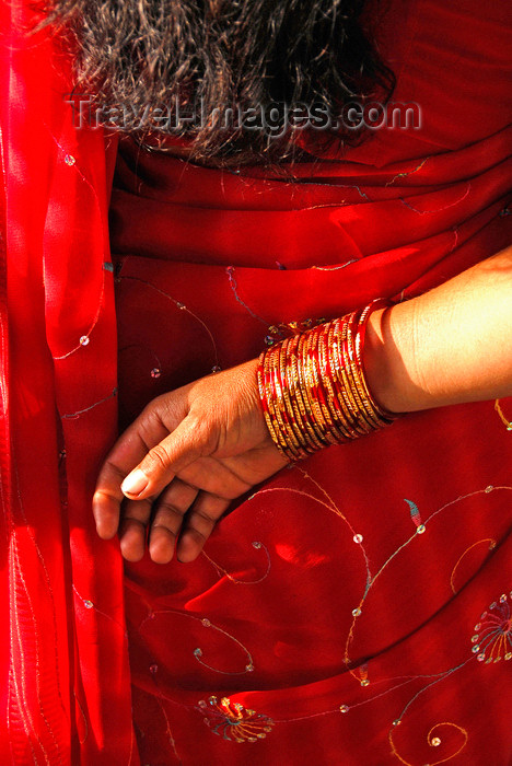 nepal201: Kathmandu, Nepal: red sari and bangle detail - photo by J.Pemberton - (c) Travel-Images.com - Stock Photography agency - Image Bank