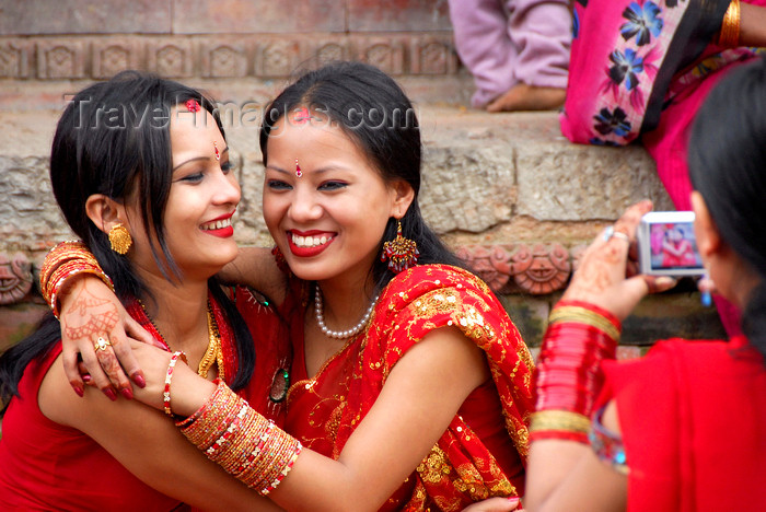 nepal207: Kathmandu, Nepal: women celebrating during the Hindu women's festival, Teej - a three-day-long celebration combining both banquets and fasting - photo by J.Pemberton - (c) Travel-Images.com - Stock Photography agency - Image Bank