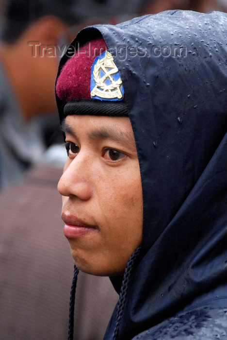 nepal218: Kathmandu, Nepal: policeman in the rain - photo by J.Pemberton - (c) Travel-Images.com - Stock Photography agency - Image Bank