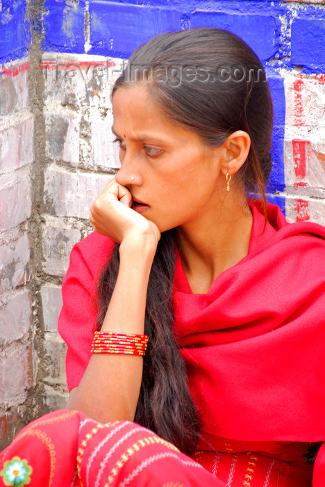 nepal224: Kathmandu, Nepal: pensive young woman in red sari - photo by J.Pemberton - (c) Travel-Images.com - Stock Photography agency - Image Bank