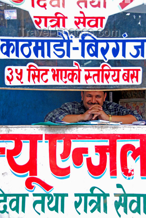 nepal231: Kathmandu, Nepal: man working at bus ticket window - Devanagari alphabet - photo by J.Pemberton - (c) Travel-Images.com - Stock Photography agency - Image Bank