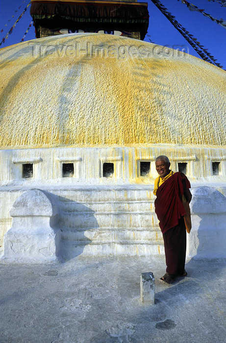 nepal246: Kathmandu valley, Nepal: Bodhnath temple - monk at the central stupa - photo by W.Allgöwer - (c) Travel-Images.com - Stock Photography agency - Image Bank