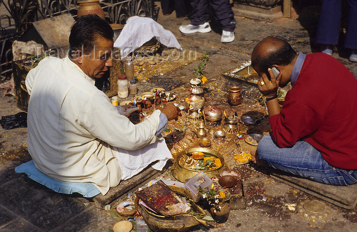 nepal253: Kathmandu valley, Nepal: Swayambhunath temple - men performing puja - prasad - offers - photo by W.Allgöwer - (c) Travel-Images.com - Stock Photography agency - Image Bank