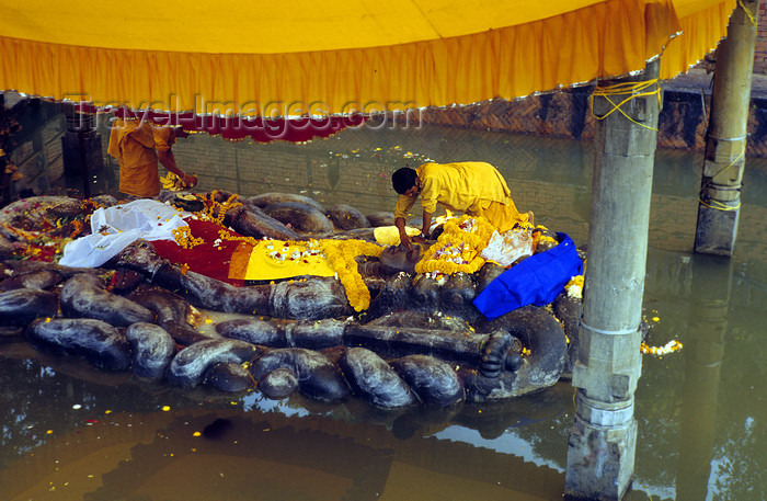 nepal271: Narayanthan village, Kathmandu valley, Nepal: Vishnu sleeping in a bed os snakes - Budhanilkantha temple, dedicated to Jalashayana Narayan - Brahmins wash the statue with a mixture of melted butter, yogurt, milk, honey and sugar - photo by W.Allgöwer - (c) Travel-Images.com - Stock Photography agency - Image Bank