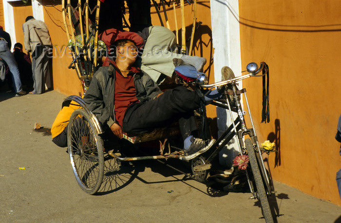 nepal280: Kathmandu, Nepal: pedicab - a cycle rickshaw driver taking a nap - Durbar Square - photo by W.Allgöwer - (c) Travel-Images.com - Stock Photography agency - Image Bank