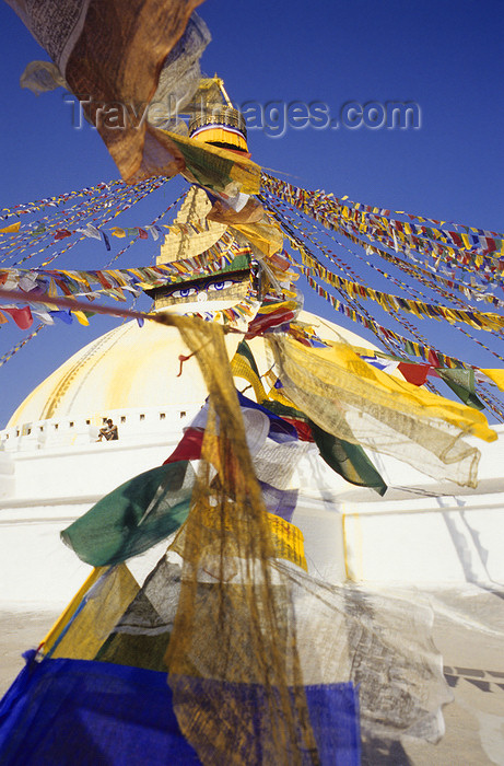 nepal284: Kathmandu valley, Nepal: Bodhnath temple complex - prayer flags at Nepal's largest stupa - it is said to entomb a Kasyapa sage venerable both to Buddhists and Hindus - photo by W.Allgöwer - (c) Travel-Images.com - Stock Photography agency - Image Bank