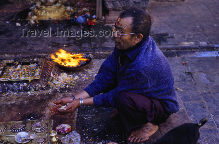 nepal293: Kathmandu valley, Nepal: Swayambhunath temple complex - man during a puja ritual - photo by W.Allgöwer - (c) Travel-Images.com - Stock Photography agency - Image Bank