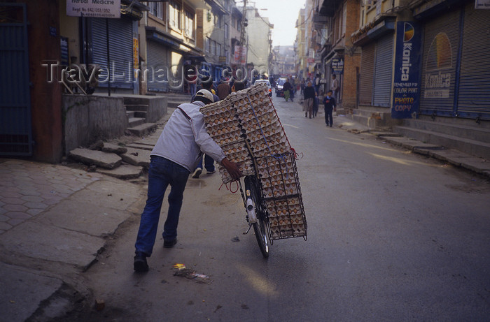 nepal294: Kathmandu, Nepal: bike transporting eggs to the market - street scene - photo by W.Allgöwer - (c) Travel-Images.com - Stock Photography agency - Image Bank