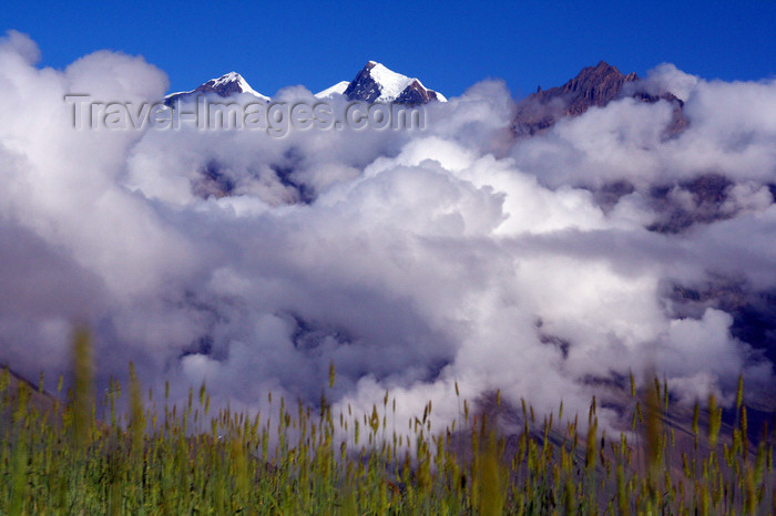 nepal312: Annapurna region, Nepal: peaks, clouds and grass - photo by M.Wright - (c) Travel-Images.com - Stock Photography agency - Image Bank