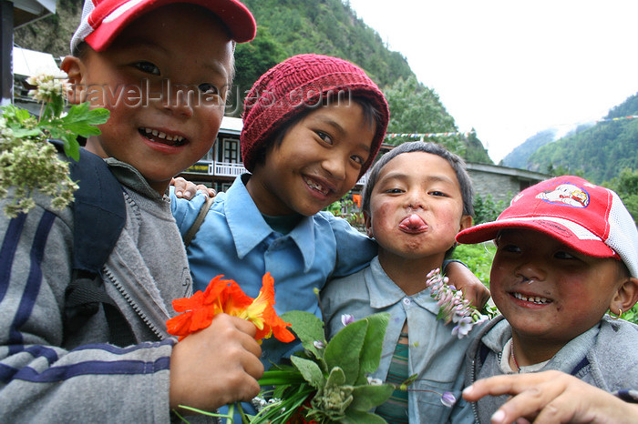 nepal319: Annapurna region, Nepal: irreverent boys - photo by M.Wright - (c) Travel-Images.com - Stock Photography agency - Image Bank