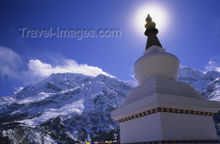 nepal349: Annapurna area, Nepal: chorten, sun and Annapurna massif - photo by W.Allgöwer - (c) Travel-Images.com - Stock Photography agency - Image Bank