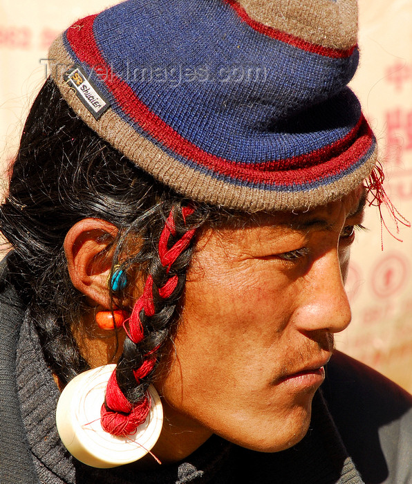 nepal426: Khumbu region, Solukhumbu district, Sagarmatha zone, Nepal: typical Tibetan hairstyle - photo by E.Petitalot - (c) Travel-Images.com - Stock Photography agency - Image Bank