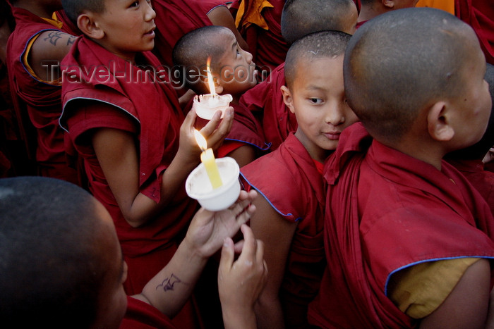 nepal447: Kathmandu, Nepal: Tibetan monks - novices in a candle walk - boy monks - Buddhism - religion - photo by G.Koelman - (c) Travel-Images.com - Stock Photography agency - Image Bank