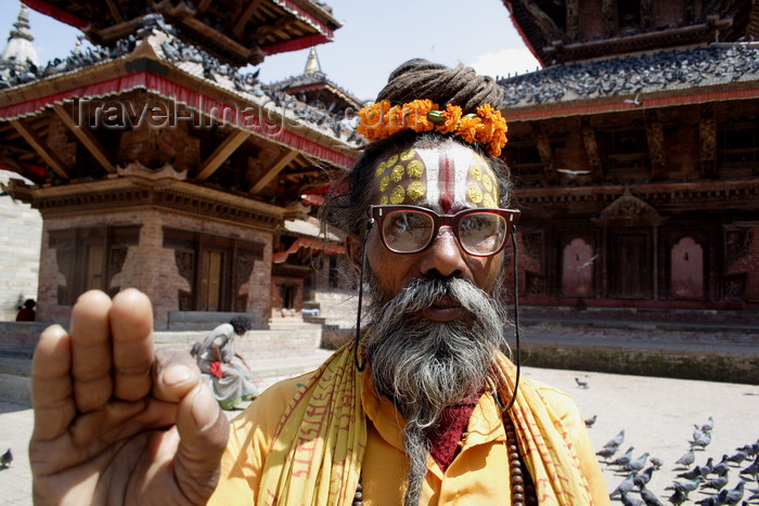 nepal48: Kathmandu, Nepal: Sadhu with floral crown - Durbar Square - photo by G.Koelman - (c) Travel-Images.com - Stock Photography agency - Image Bank