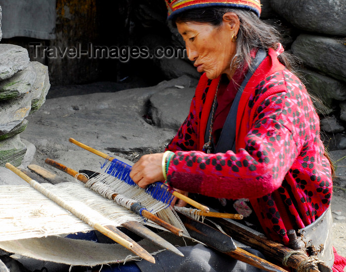 nepal8: Nepal - Langtang region - old woman weaving a carpet - photo by E.Petitalot - (c) Travel-Images.com - Stock Photography agency - Image Bank