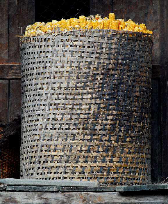 nepal83: Nepal - Langtang region - corn stocked in a big basket  - photo by E.Petitalot - (c) Travel-Images.com - Stock Photography agency - Image Bank