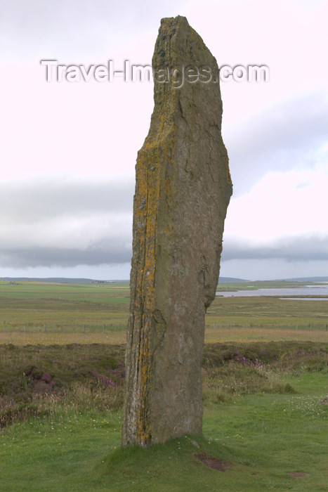 orkney34: Orkney island, Mainland - Because the interior of the Ring o' Brodgar has never been fully excavated or scientifically dated, the monument's age remains uncertain. However, it is generally thought to have been erected between 2500 BC and 2000 BC, and was  - (c) Travel-Images.com - Stock Photography agency - the Global Image Bank