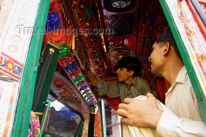 pakistan204: Peshawar, NWFP, Pakistan: boys working in a truck painting workshop - photo by G.Koelman - (c) Travel-Images.com - Stock Photography agency - Image Bank