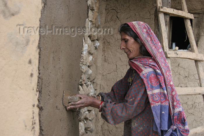 pakistan97: Kodar Bala, Siran Valley, North-West Frontier Province, Pakistan: old woman plastering a house - photo by R.Zafar - (c) Travel-Images.com - Stock Photography agency - Image Bank