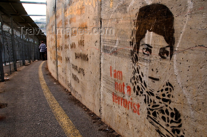 palest15: Bethlehem, West Bank, Palestine: graffitti on wall outside checkpoint - Palestinian woman's face and caption 'I am not a terrorist' - photo by J.Pemberton - (c) Travel-Images.com - Stock Photography agency - Image Bank