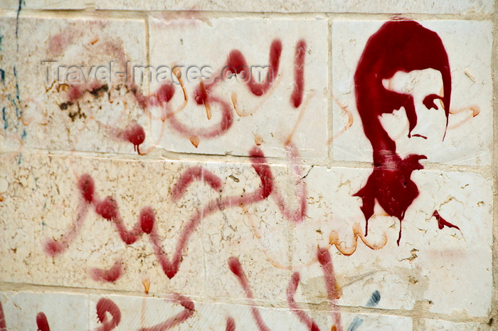 palest17: Dheisheh Refugee Camp, West Bank, Palestine: martyr's portrait stenciled  on wall - pochoir graffitti - photo by J.Pemberton - (c) Travel-Images.com - Stock Photography agency - Image Bank