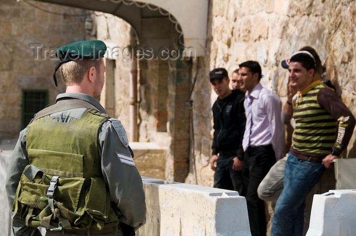 palest27: Hebron, West Bank, Palestine: Palestinians wait for clearance at checkpoint - photo by J.Pemberton - (c) Travel-Images.com - Stock Photography agency - Image Bank