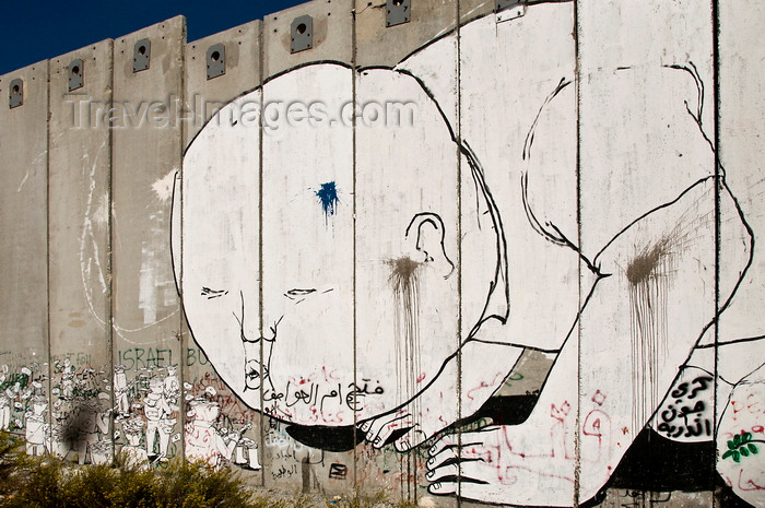 palest35: near Bethlehem, West Bank, Palestine: graffitti on Wall - blowing - concrete slabs of the separation fence - photo by J.Pemberton - (c) Travel-Images.com - Stock Photography agency - Image Bank