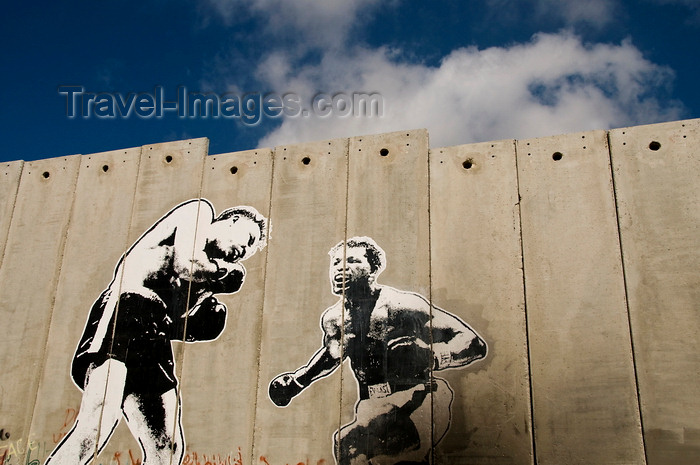 palest36: near Bethlehem, West Bank, Palestine: graffitti on Wall - boxers - concrete slabs of the separation fence - photo by J.Pemberton - (c) Travel-Images.com - Stock Photography agency - Image Bank