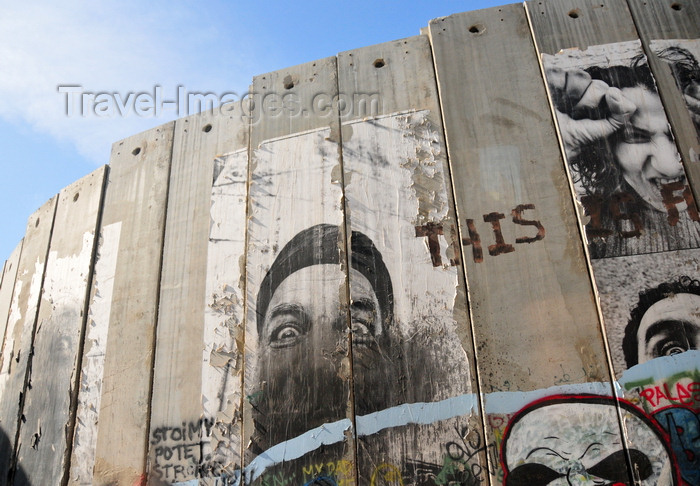 palest46: Bethlehem, West Bank, Palestine: faces on the Israeli West Bank barrier - fortified slabs of concrete - photo by M.Torres - (c) Travel-Images.com - Stock Photography agency - Image Bank