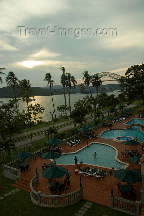 panama17: Panama - Panama Canal: Bridge of the Americas - Pacific entrance to the Panama Canal / puente de las Americas - formerly the Thatcher Ferry Bridge - hotel swimming pools in the foreground - Panama province - photo by D.Smith - (c) Travel-Images.com - Stock Photography agency - Image Bank