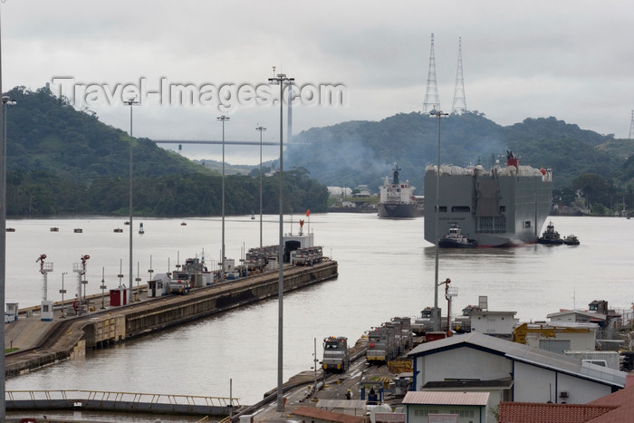 panama229: Panama Canal - car transporting vessel exits the Miraflores locks - Centennial bridge and Pedro Miguel locks in the background - photo by H.Olarte - (c) Travel-Images.com - Stock Photography agency - Image Bank