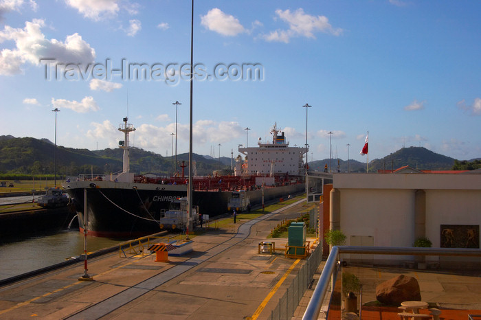 panama236: Panama Canal - Miraflores locks - the Chimborazo is towed by the locomotives - photo by H.Olarte - (c) Travel-Images.com - Stock Photography agency - Image Bank