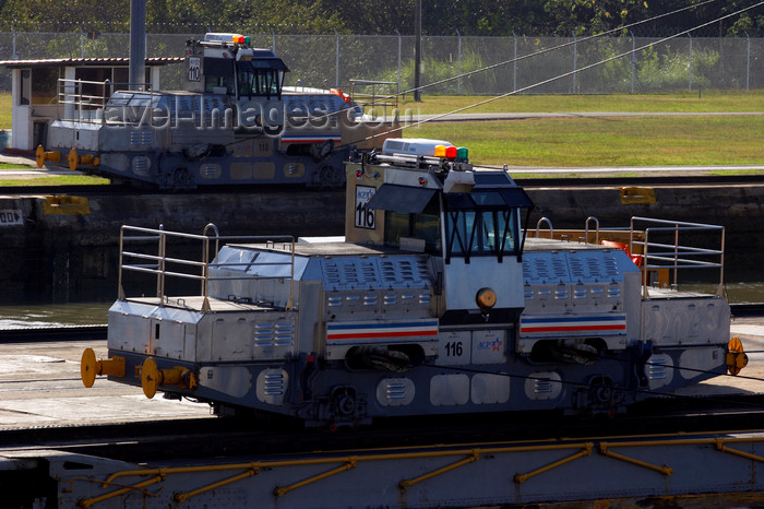 panama238: Panama Canal - Miraflores locks - locomotives used to tow ships along the locks - photo by H.Olarte - (c) Travel-Images.com - Stock Photography agency - Image Bank