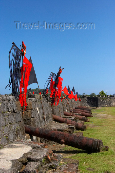 panama271: Fuerte de San Jeronimo - cannons and flags, Portobello, Colon, Panama, Central America, during the bi-annual devils and congo festival - photo by H.Olarte - (c) Travel-Images.com - Stock Photography agency - Image Bank