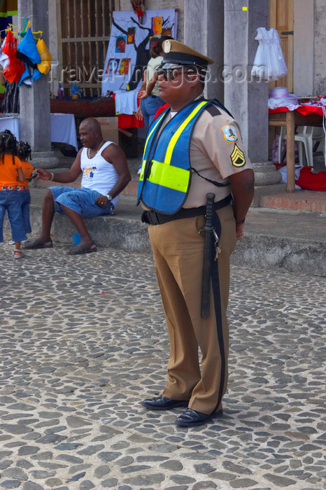 panama281: A Panamanian policeman watches the crowd at devils and congo festival, Portobello, Colon, Panama, Central America - photo by H.Olarte - (c) Travel-Images.com - Stock Photography agency - Image Bank