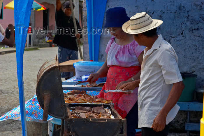 panama291: A man and a woman grill some meat for vending - Portobello, Colon, Panama - photo by H.Olarte - (c) Travel-Images.com - Stock Photography agency - Image Bank