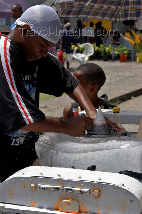 panama292: A young black man makes some shaved ice - Portobello, Colon, Panama - photo by H.Olarte - (c) Travel-Images.com - Stock Photography agency - Image Bank