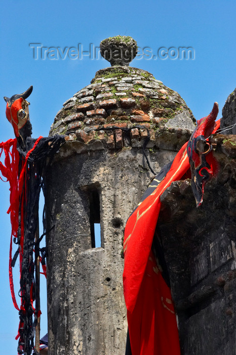 panama293: Fuerte de San Jeronimo - flags and a devil's cross, Portobello, Colon, Panama, Central America, during the bi-annual devils and congo festival - photo by H.Olarte - (c) Travel-Images.com - Stock Photography agency - Image Bank