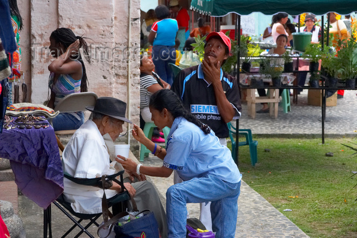 panama297: A woman feeds an old man - in the Panamanian tradition, the elders are cared for by the younger relatives - Portobello, Colon, Panama - photo by H.Olarte - (c) Travel-Images.com - Stock Photography agency - Image Bank