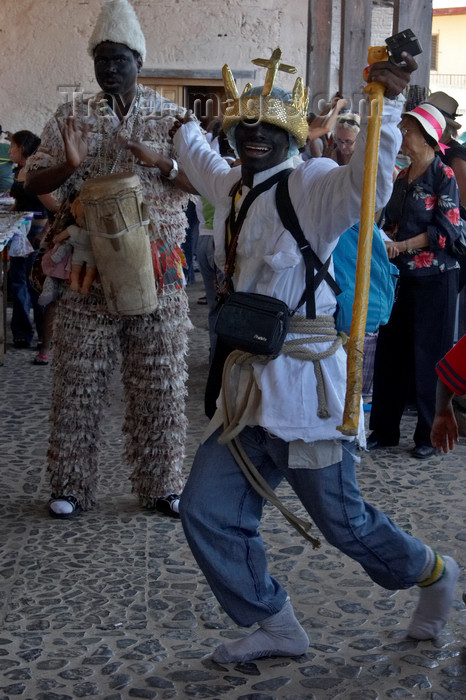 panama302: A congo culture man dances to the beat of the drum at the meeting of devils and congos. Portobello, Colon, Panama, Central America - photo by H.Olarte - (c) Travel-Images.com - Stock Photography agency - Image Bank