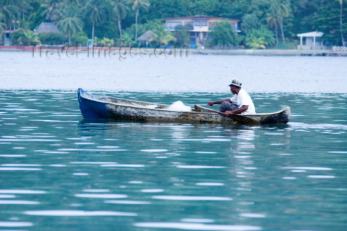 panama329: man on a cayuco - Isla Grande, Colon, Panama, Central America - photo by H.Olarte - (c) Travel-Images.com - Stock Photography agency - Image Bank