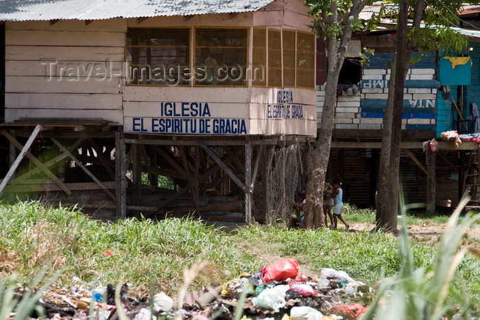 panama482: Panama City / Ciudad de Panama: shabby Evangelic church on stilts - Iglesia El Espiritu de Gracia - Curundu  - photo by H.Olarte - (c) Travel-Images.com - Stock Photography agency - Image Bank