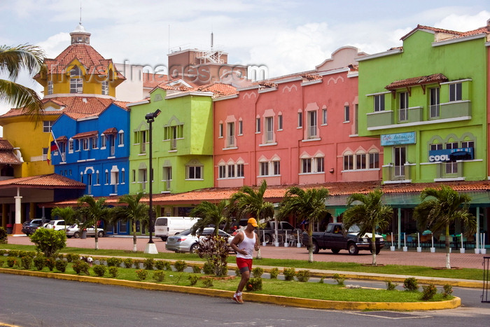 panama567: Colón, Panama: Colon 2000 cruise ship terminal, Colon City - colourful façades and jogger - photo by H.Olarte - (c) Travel-Images.com - Stock Photography agency - Image Bank