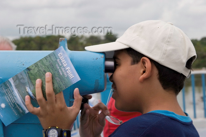 panama576: Galeta Island, Colón province, Panama: young latino boy looking thru a telescope - Smithsonian Tropical Research Institute, Galeta Point - photo by H.Olarte - (c) Travel-Images.com - Stock Photography agency - Image Bank