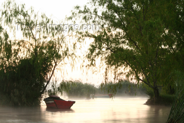 paraguay15: Paraguay - Aregua: Boat and vegetation on the lake Ypacarai / lago Ypacarai (photo by Andre Marcos Chang) - (c) Travel-Images.com - Stock Photography agency - Image Bank