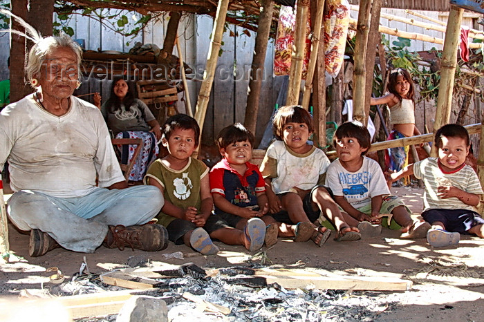 paraguay80: Presidente Hayes department, Paraguay: Maka indians near Puente Remanso - elderly man with the village's children - photo by A.Chang - (c) Travel-Images.com - Stock Photography agency - Image Bank